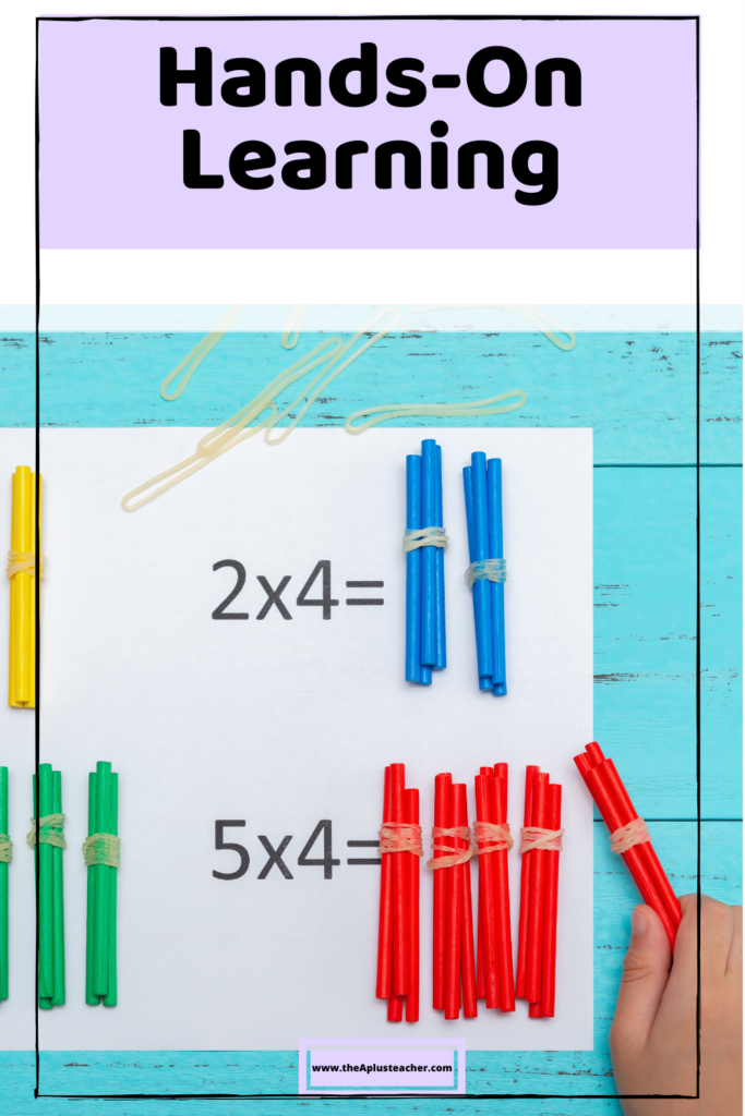 title says hands-on learning and picture is of groups of sticks bundled together to represent hands-on math multiplication problems 